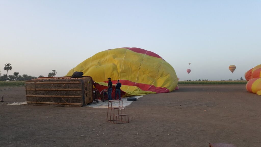 Hot air balloons in the Luxor sunrise landscape