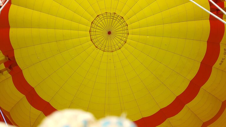 View into the yellow interior of a hot air balloon envelope